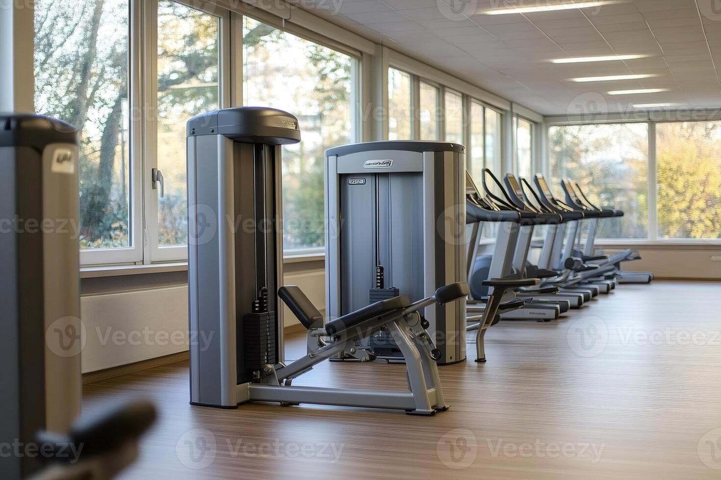 Modern gym equipment stands ready for exercising in fitness center photo