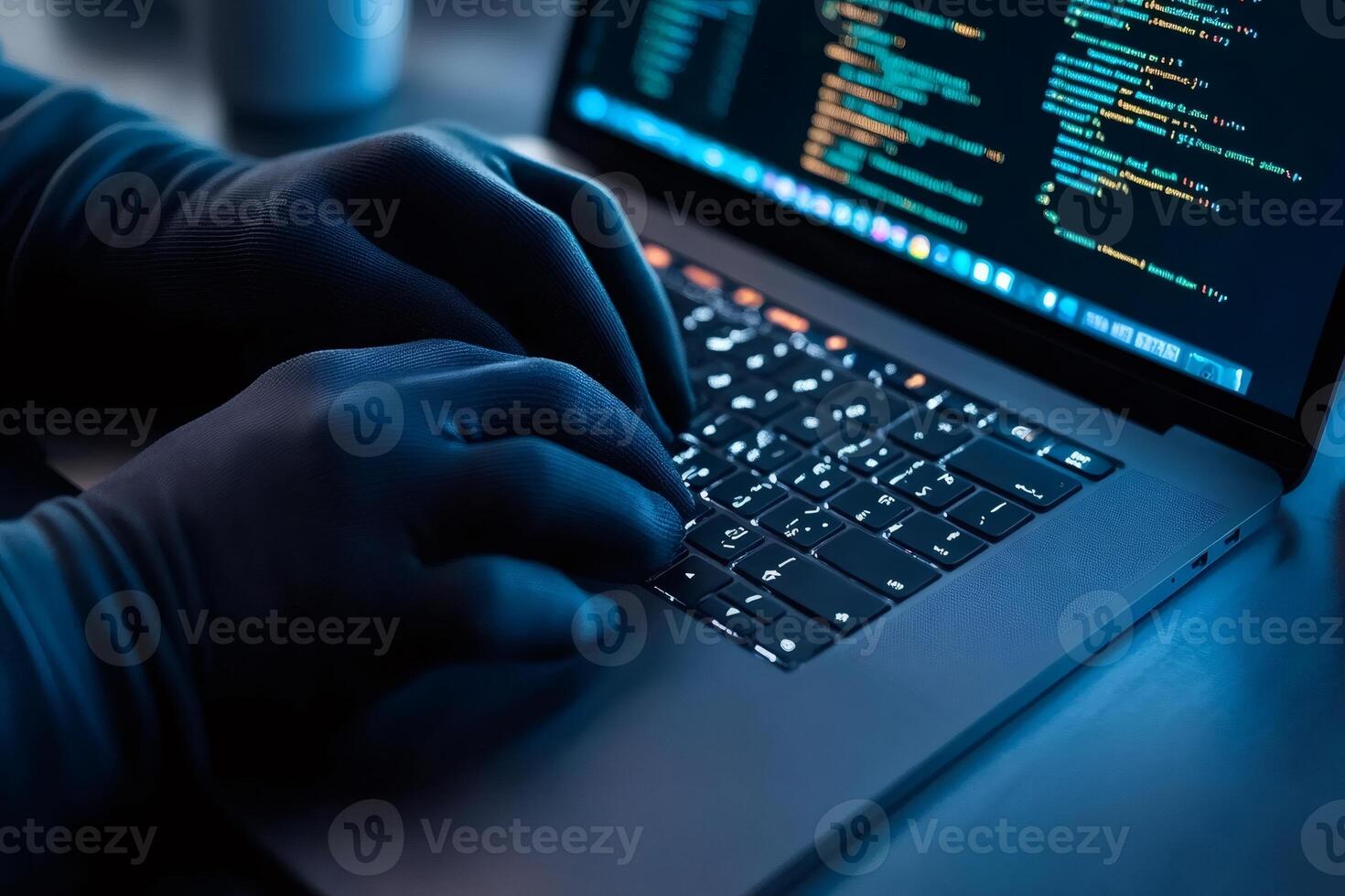 Hacker coding on laptop keyboard wearing gloves, cyber security concept photo