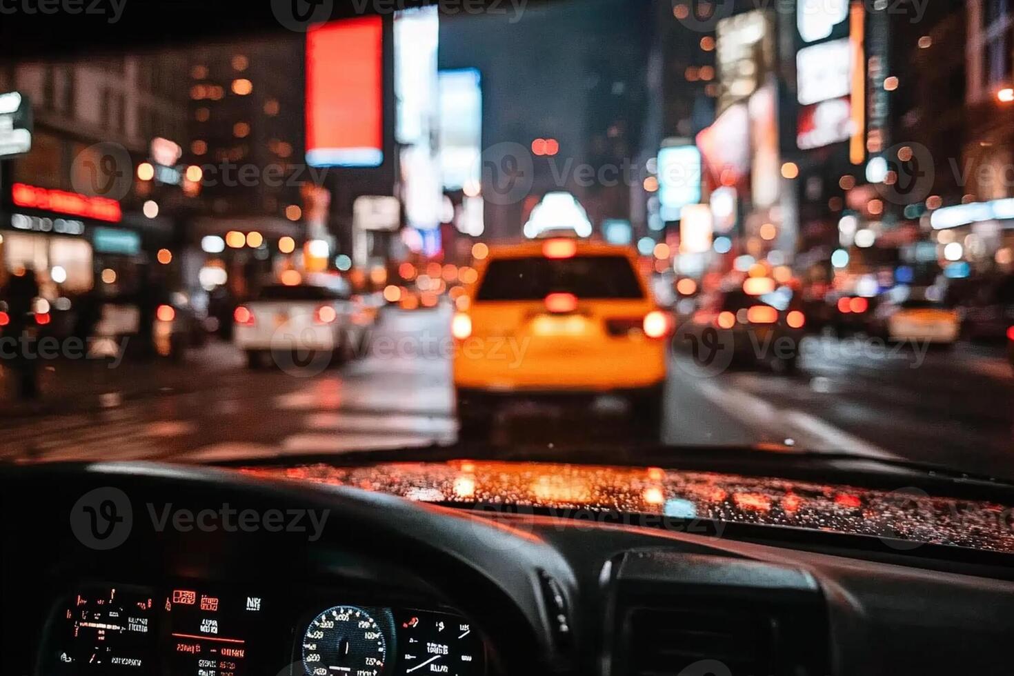 A view of the dashboard of a car at night photo