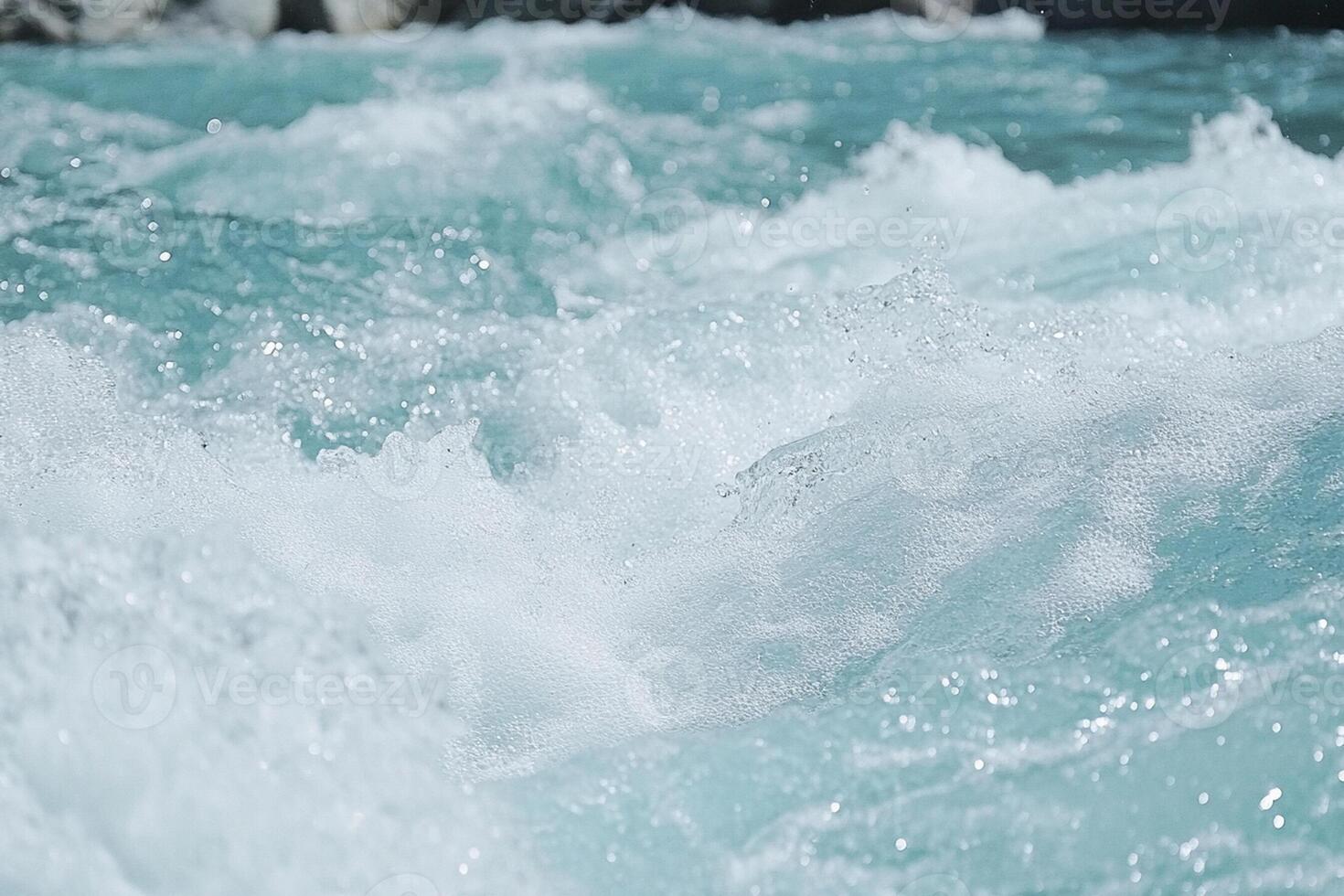 A close up of a wave in the water photo