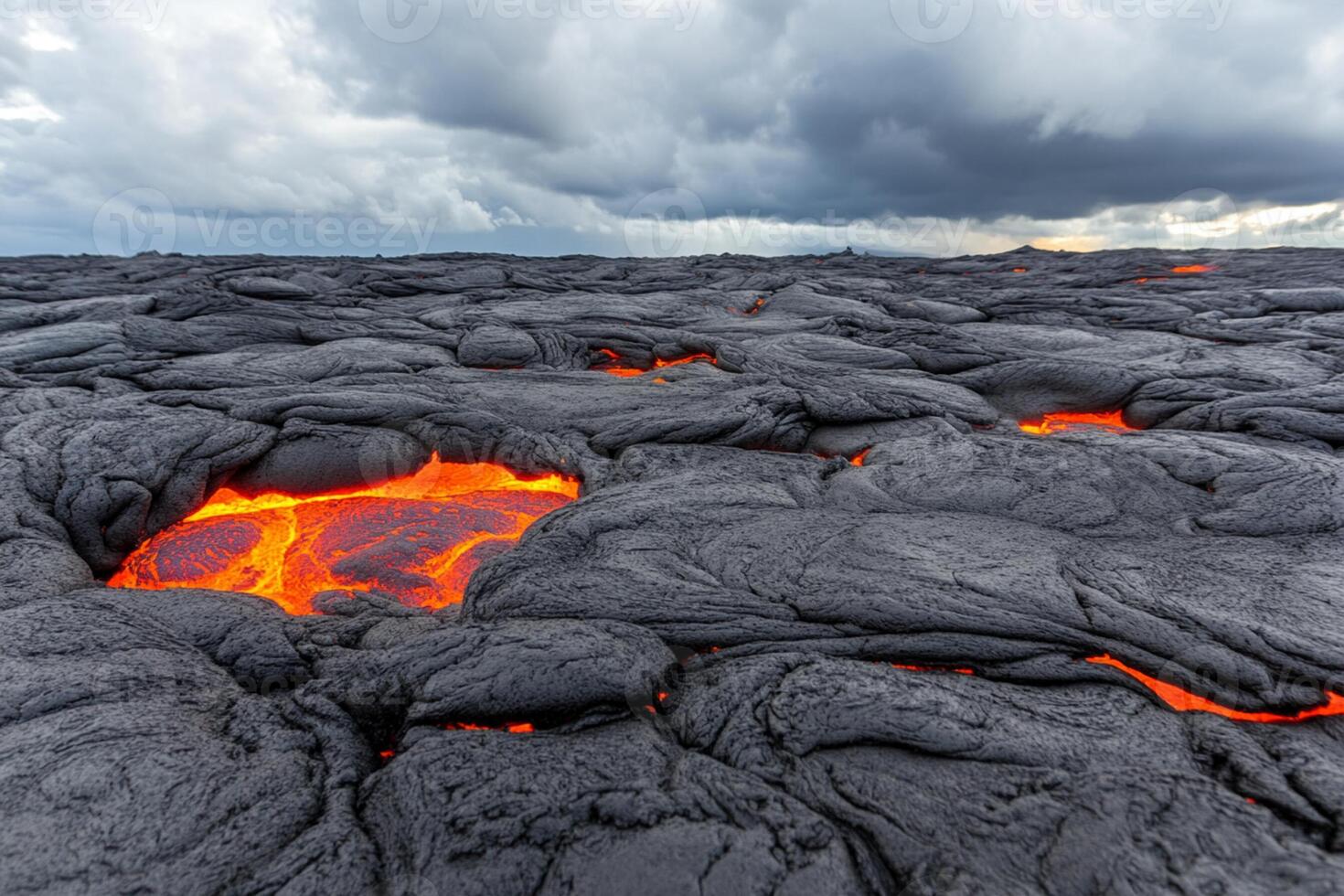 Lava flows from the ground in a lava field photo