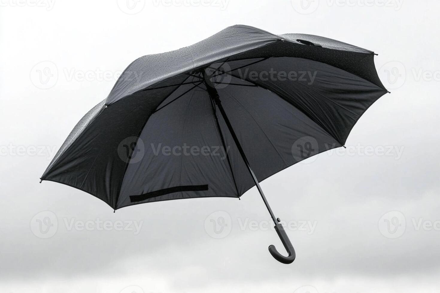 An umbrella is flying in the air photo