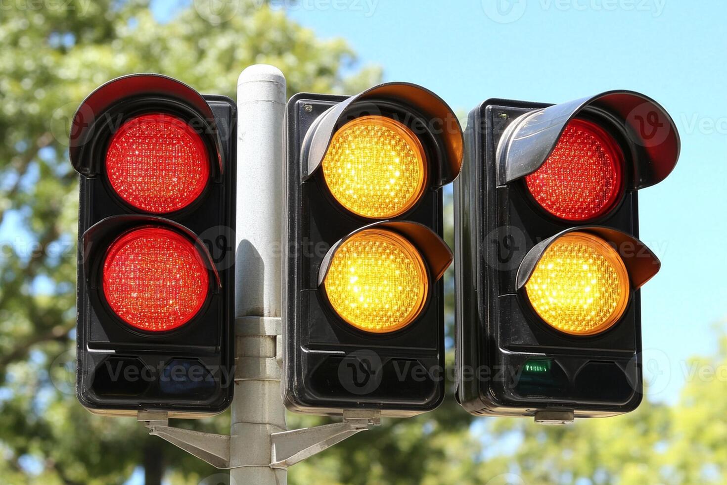 A traffic light with red and yellow lights photo