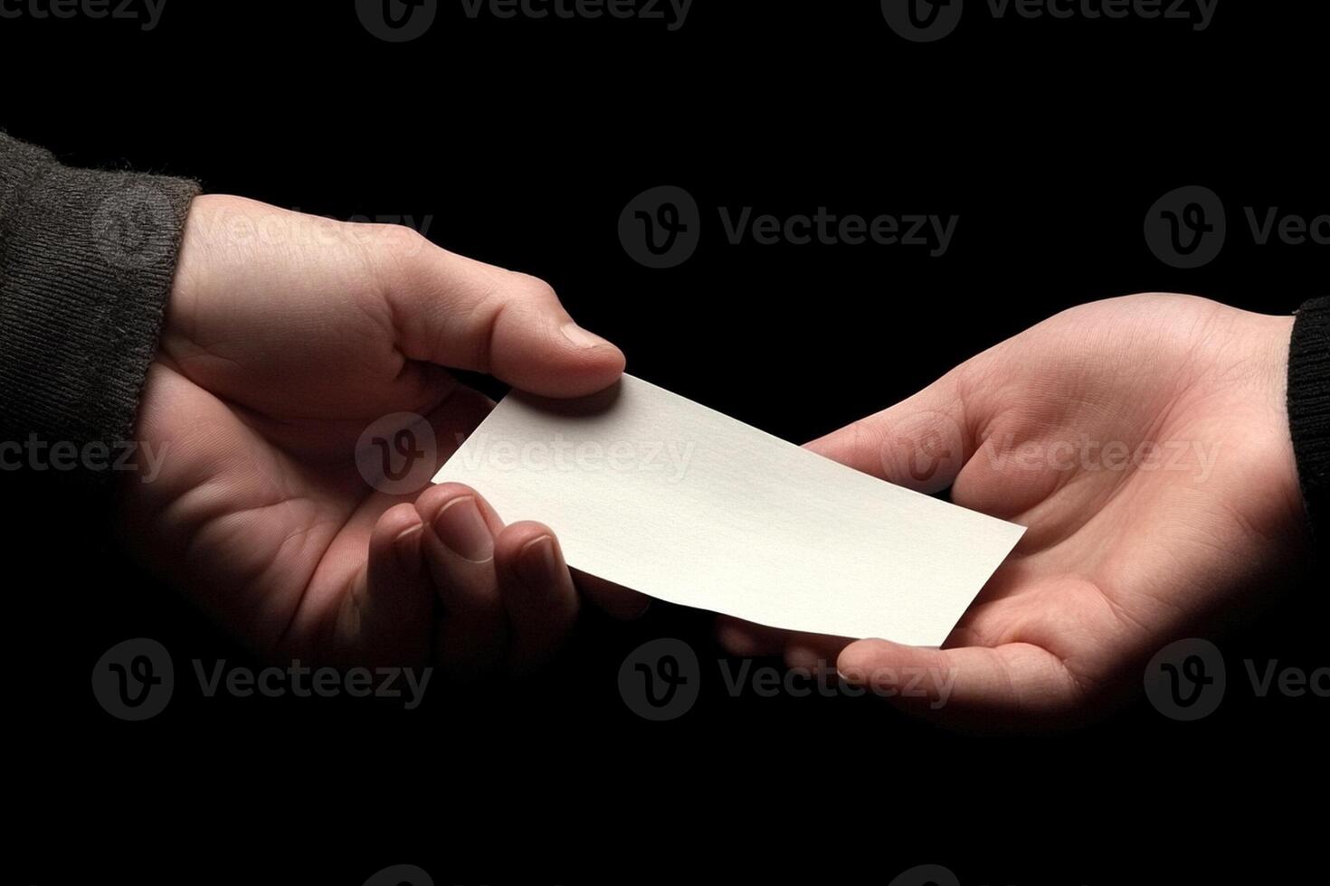Two hands holding a blank piece of paper photo