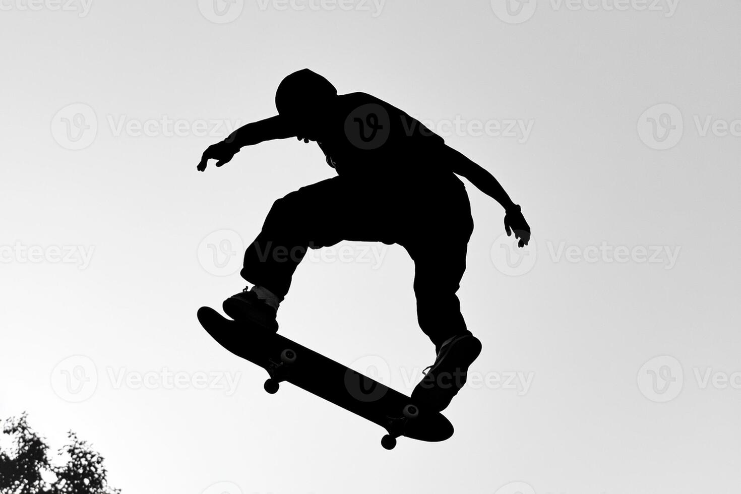 A person is doing a trick on a skateboard photo