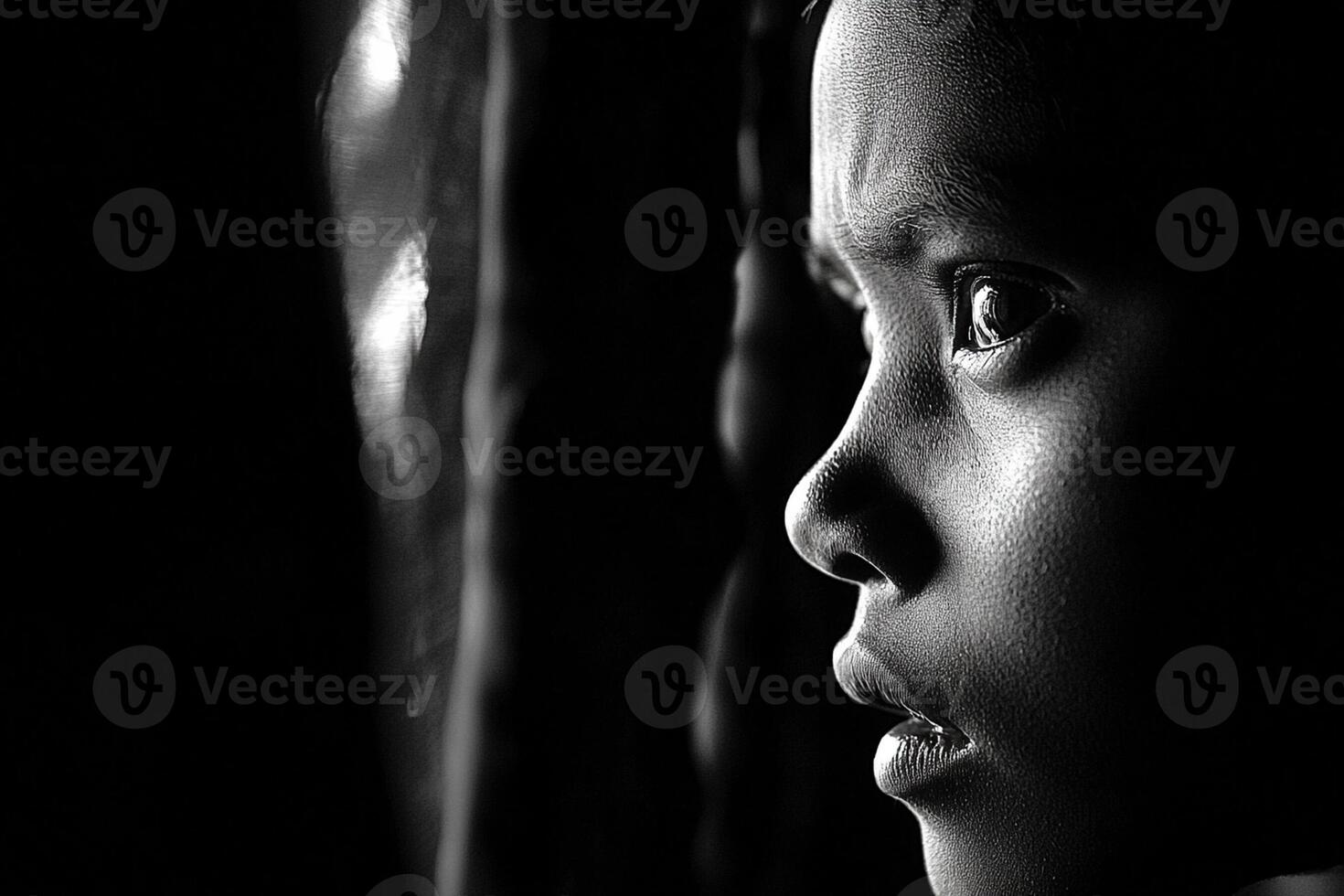 A child staring out the window photo