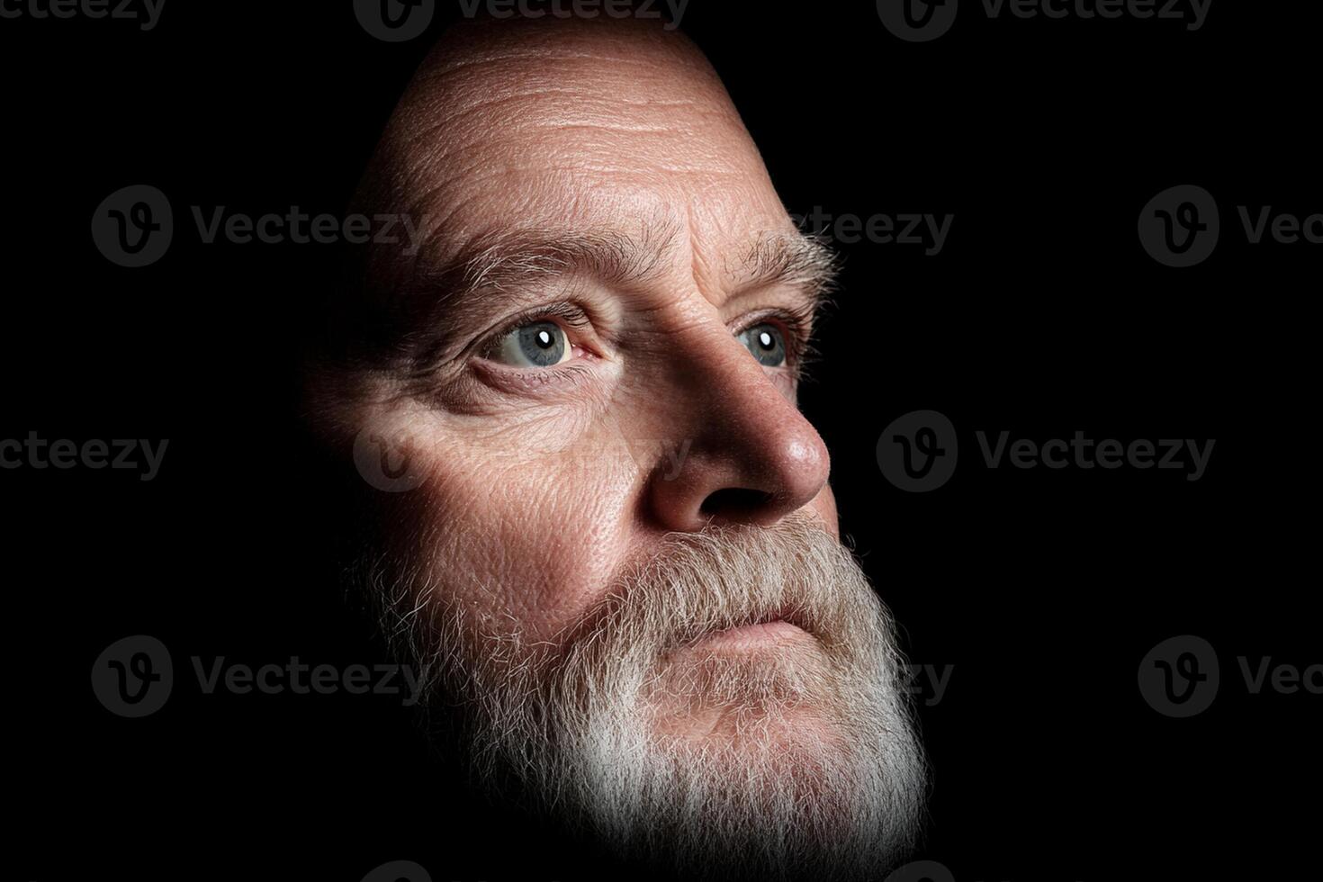 A man with a beard and a white beard photo