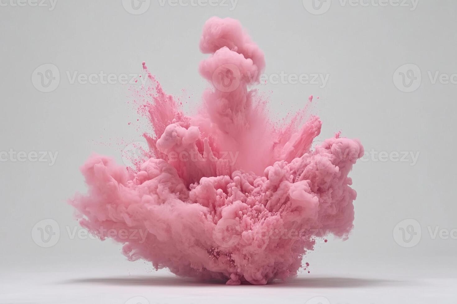 A pink powder is being thrown into the air photo