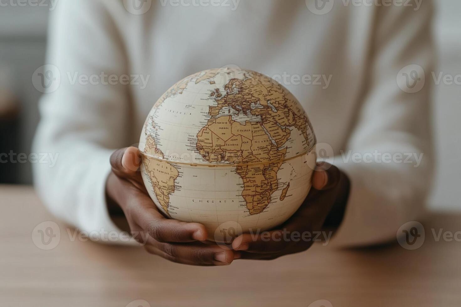 African woman holding world globe photo