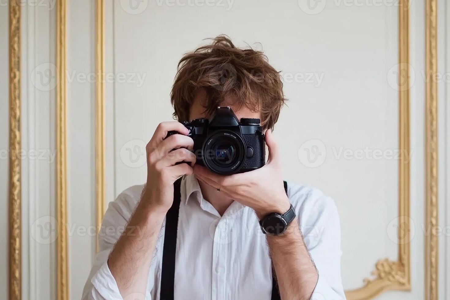 A man taking a photo with a camera