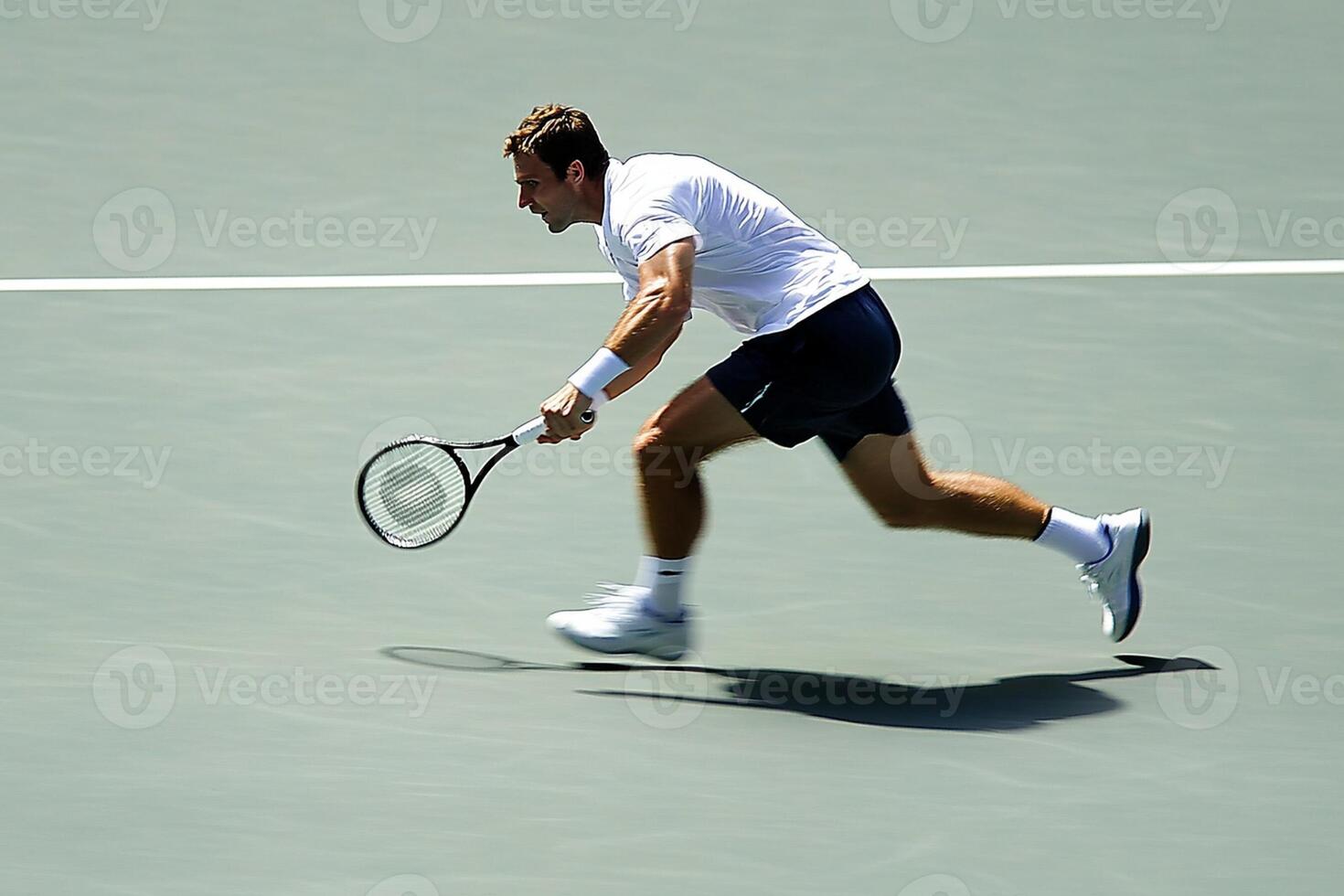 A man playing tennis photo
