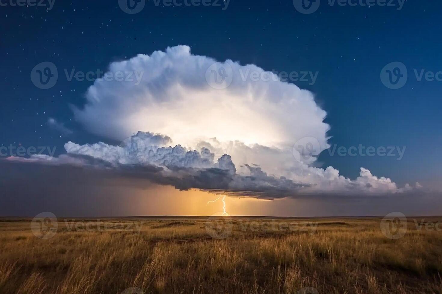 A large cloud is seen in the sky with a lightning bolt photo