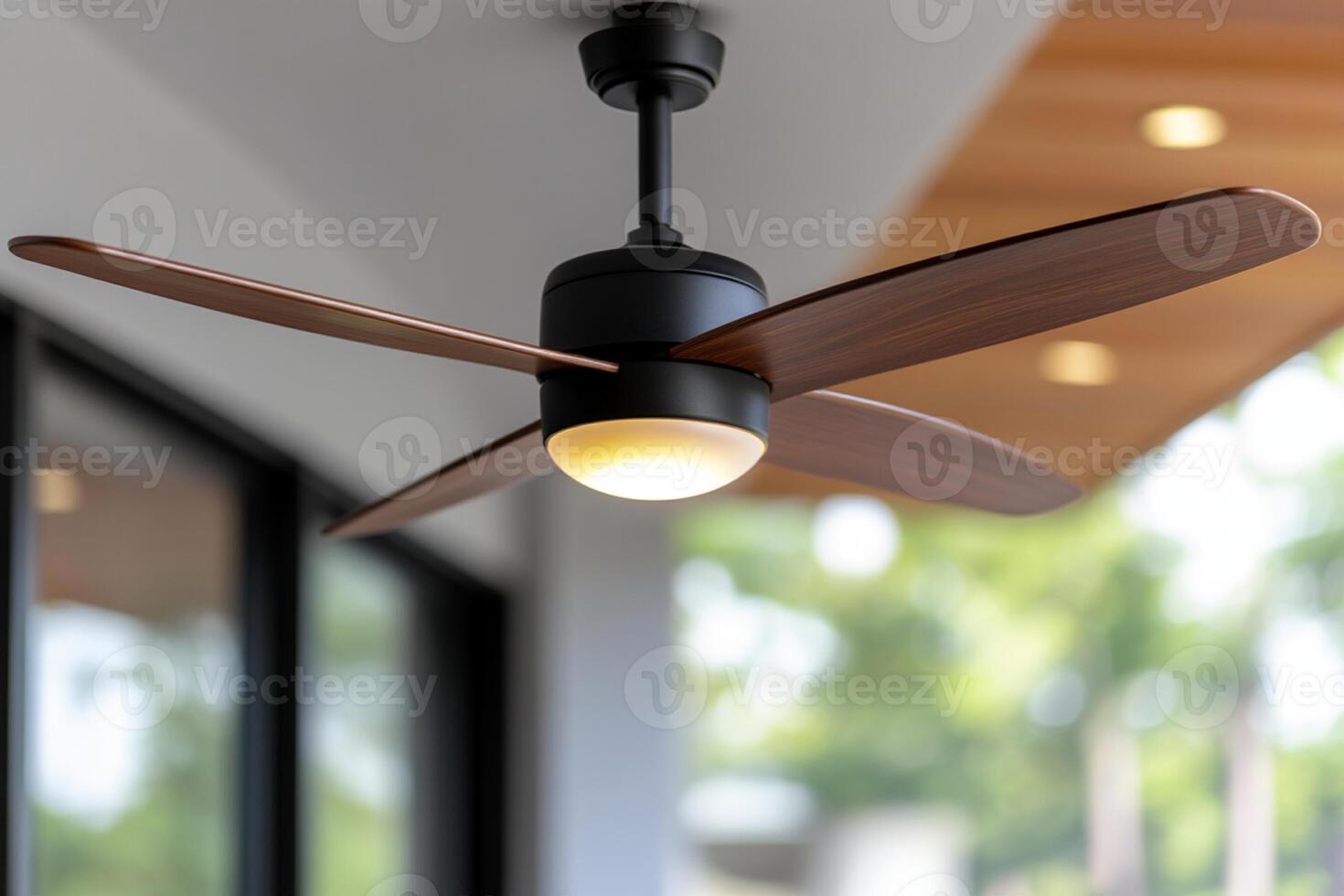 A ceiling fan with a light on it photo