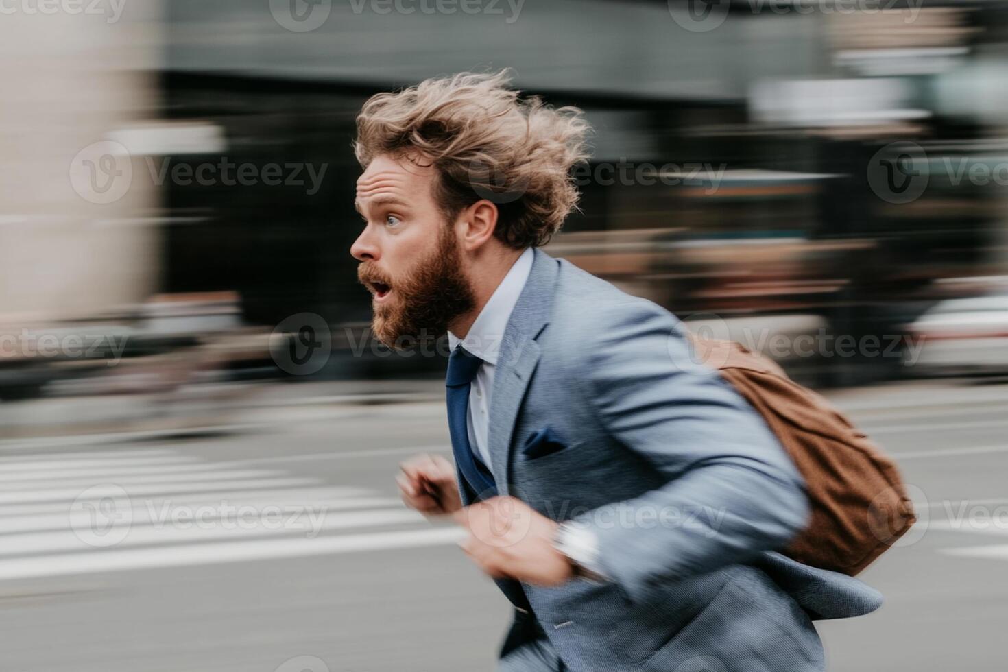 A man with a beard and suit running in the street photo
