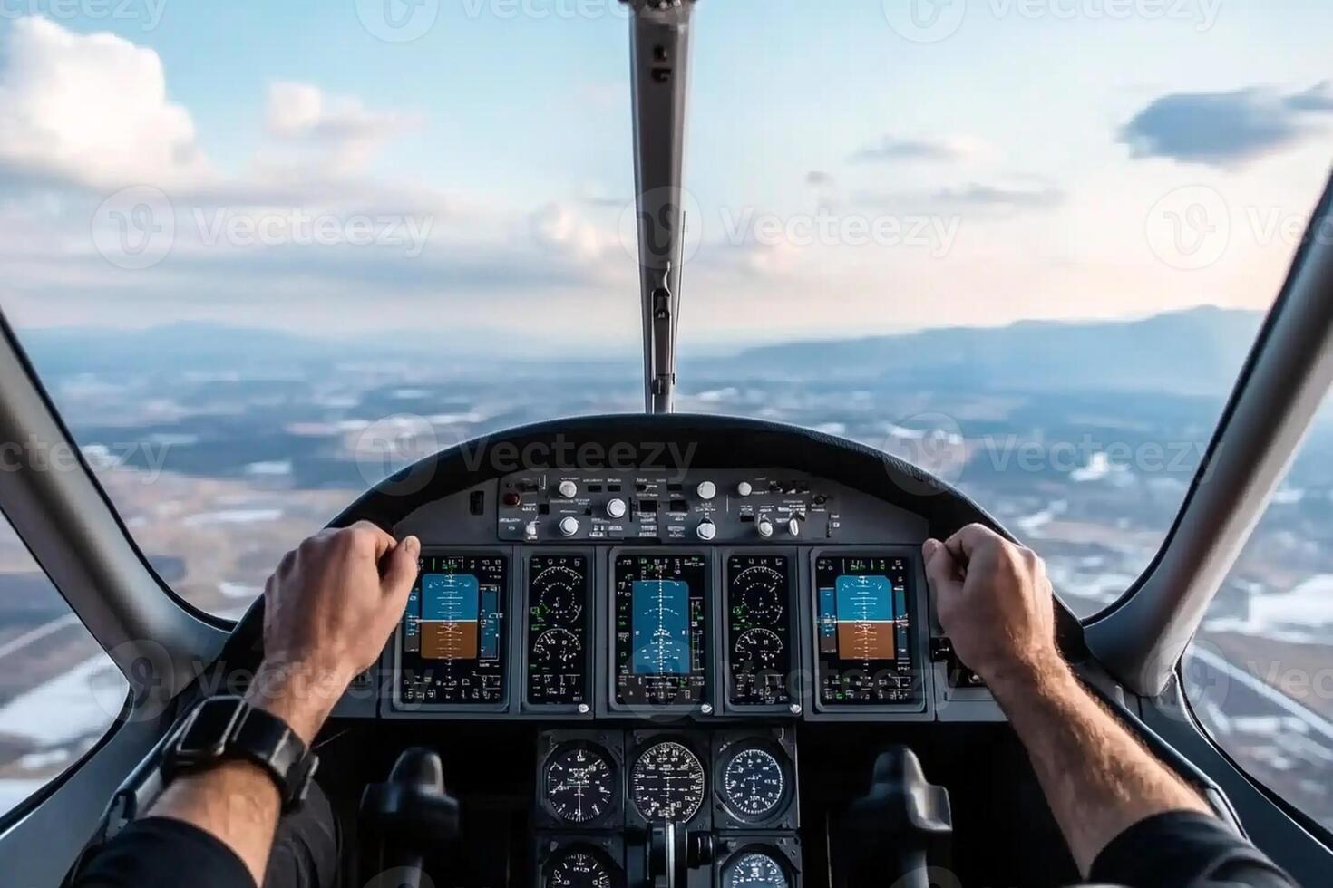 A person is driving a small airplane with the controls in the cockpit photo