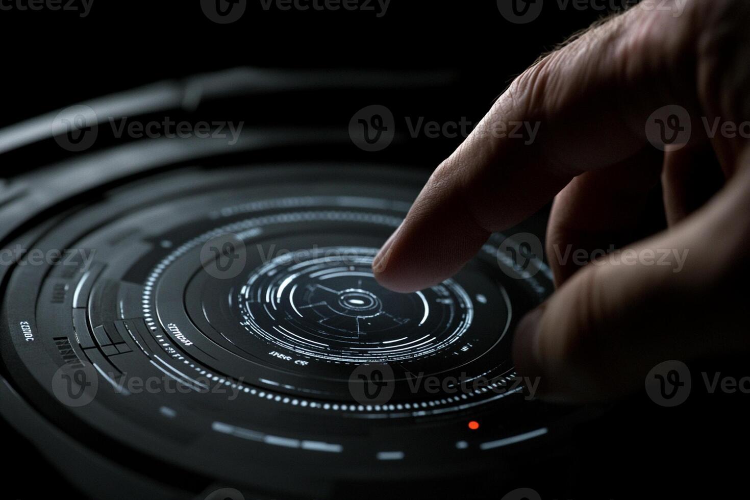 A person touching a futuristic interface on a black surface photo