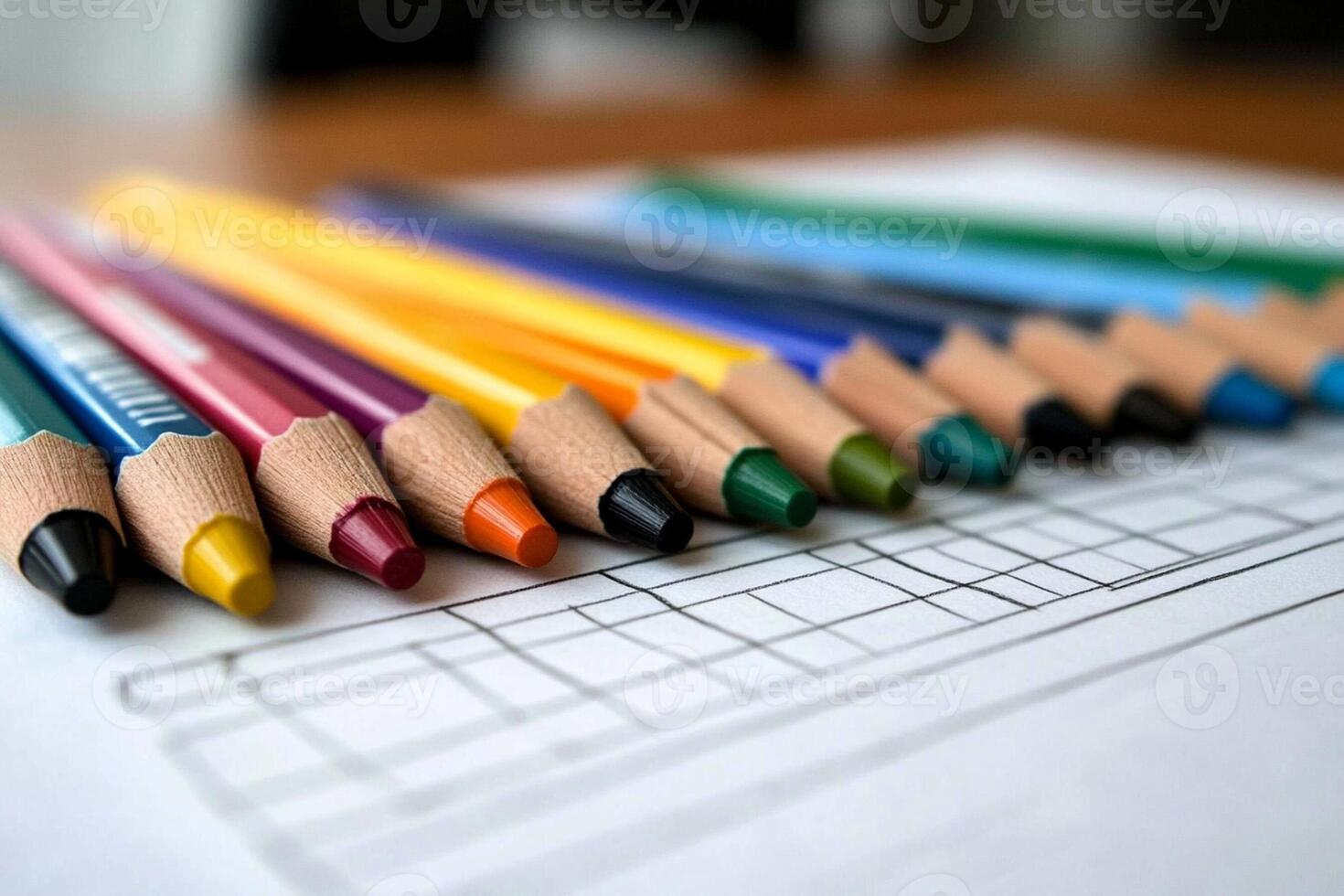 A group of colored pencils on a paper photo