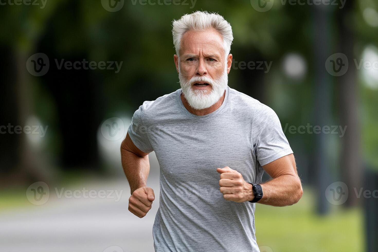 An older man with a white beard running photo