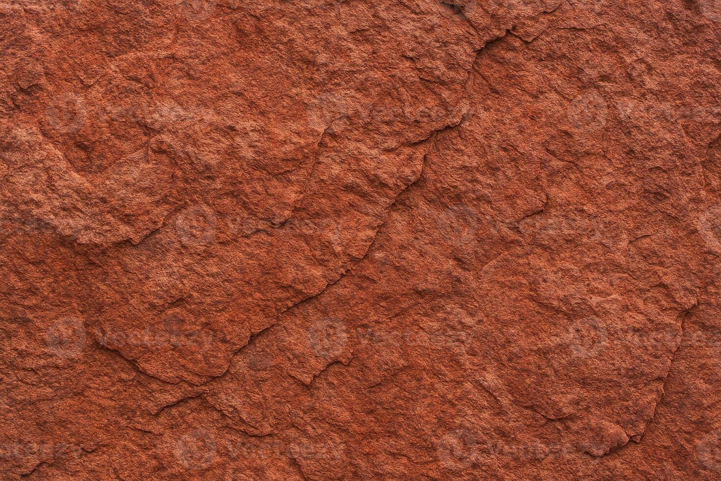 Red Brown Stone Background With Mountain Texture Close Up, Bright Rock Surface Ideal For Design Projects And Nature Themes, Perfect For Use In High-Resolution Textures And Backdrops photo