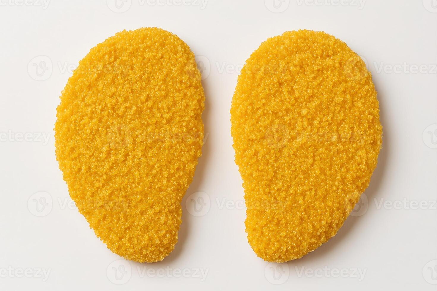 Two Breaded Chicken Schnitzels with Golden Crispy Coating for Quick Meal Preparation photo