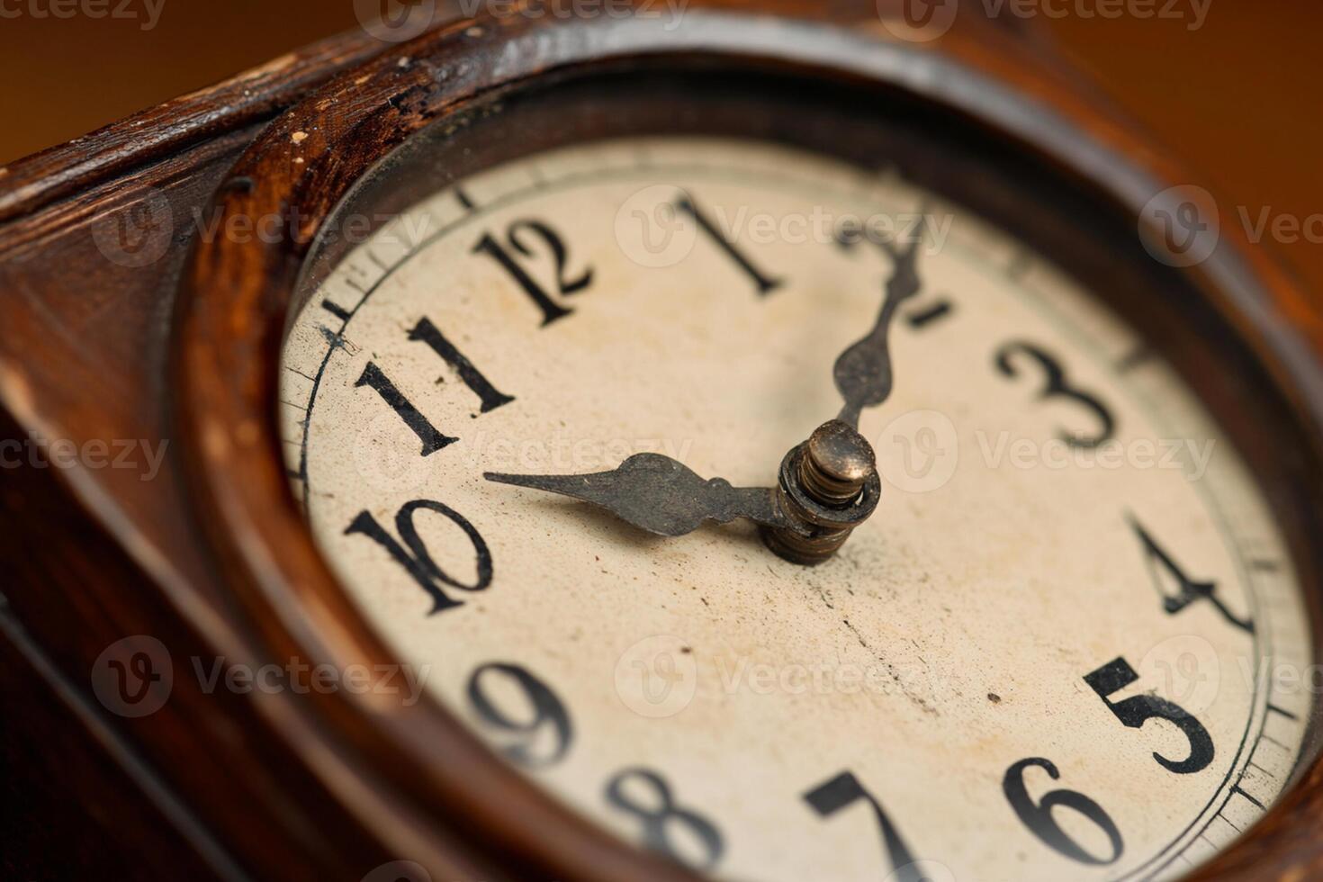 A clock with a wooden frame photo