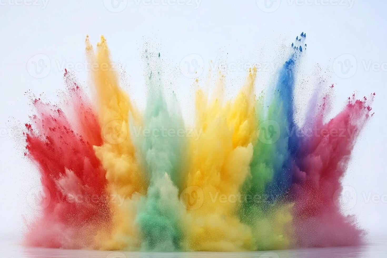 Colorful powder being thrown into the air photo