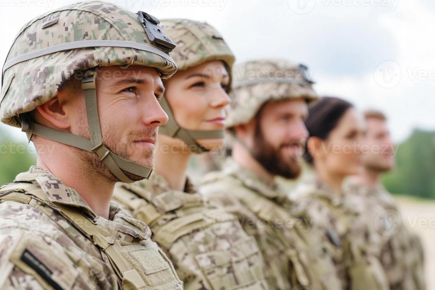 A group of soldiers are standing in a row photo