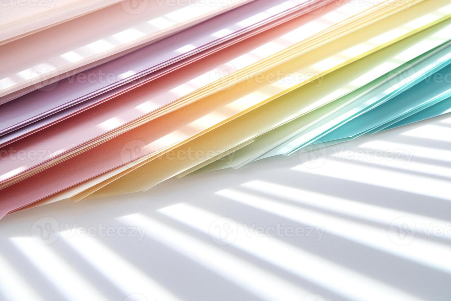 A rainbow colored paper is shown in the sunlight photo