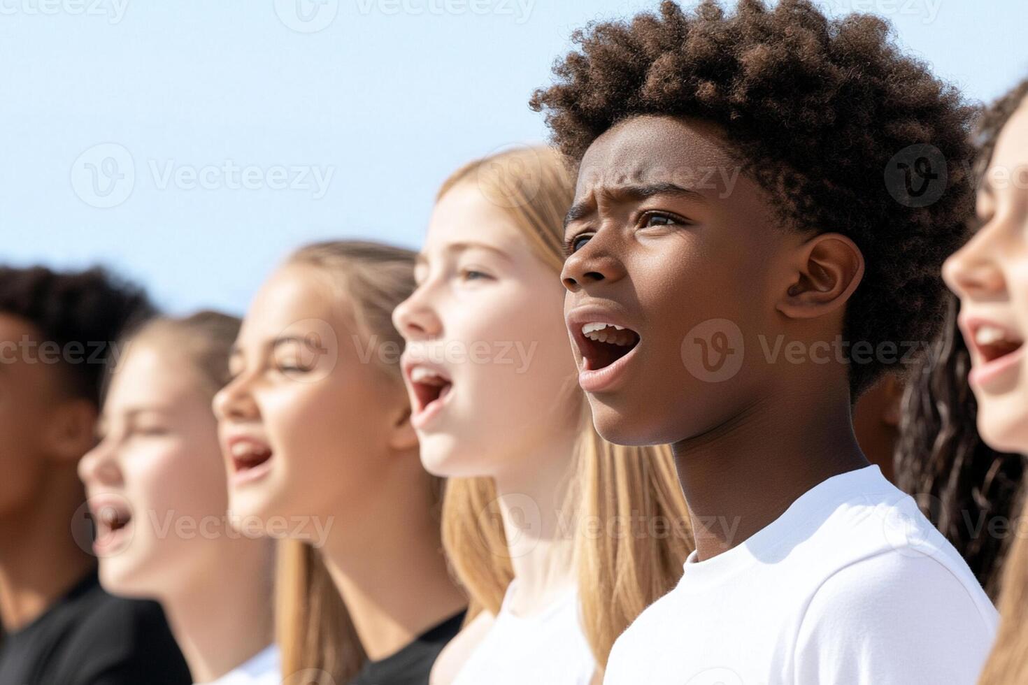 A group of young people singing together photo