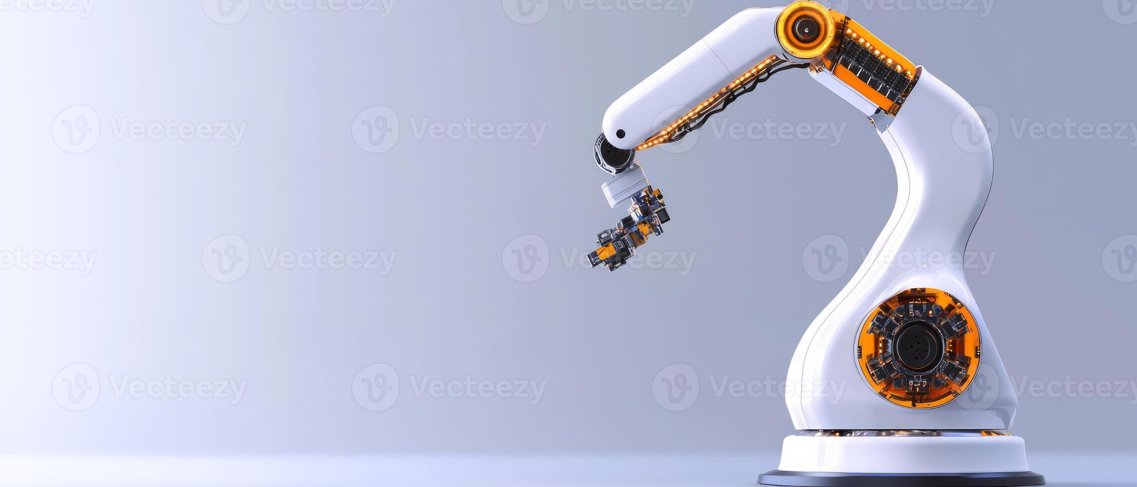A robotic arm with orange and white design skillfully grabs a small object in a clean, well-lit workspace, showcasing advanced automation technology photo