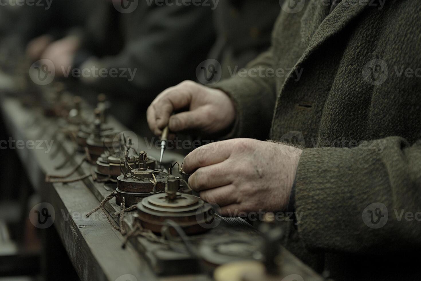A man working on a clock photo