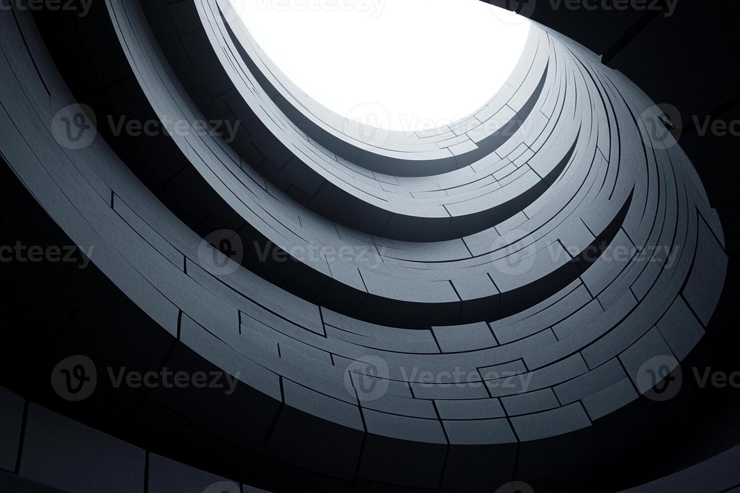 A black and white photo of a circular building