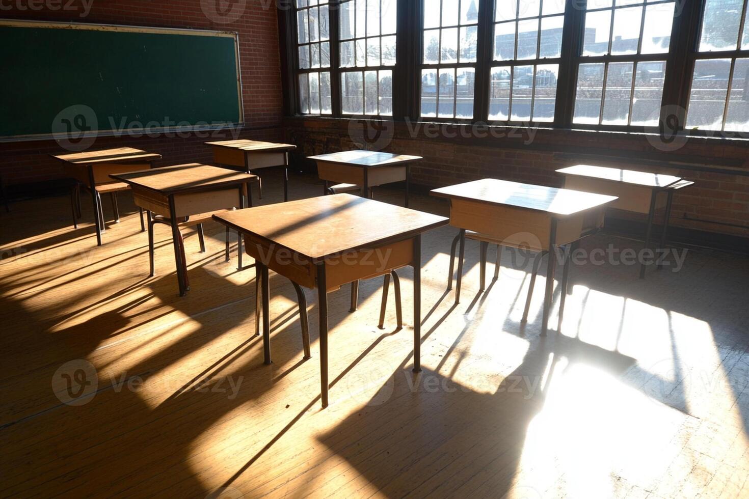 A classroom with desks and chairs in the sun photo