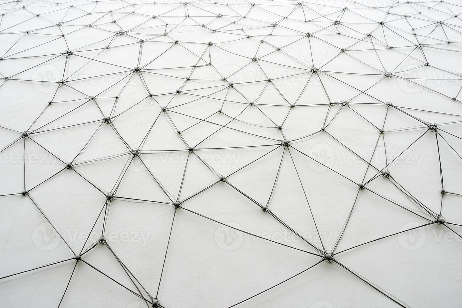 A white wall with a lot of wires photo