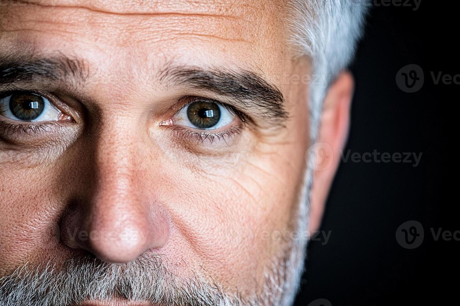 A close up of a man with a white beard photo