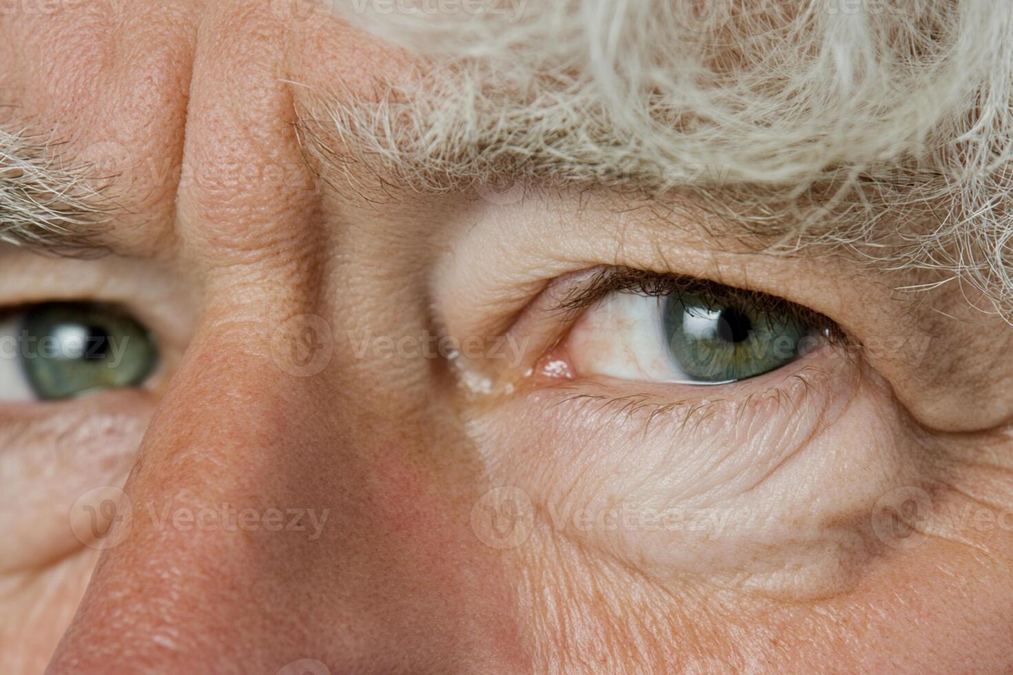 A close up of an older man's eyes photo