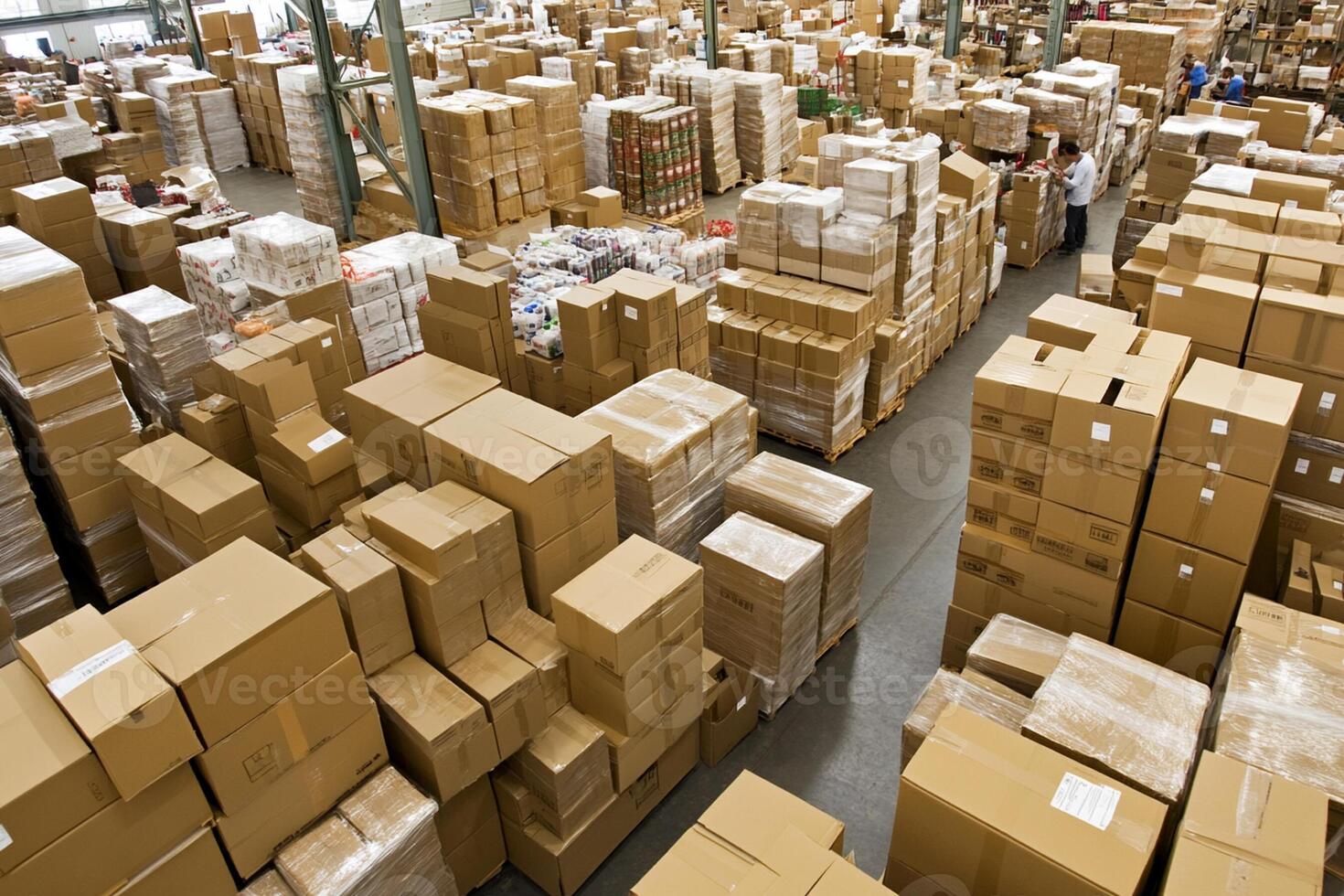 A large warehouse filled with boxes and people photo