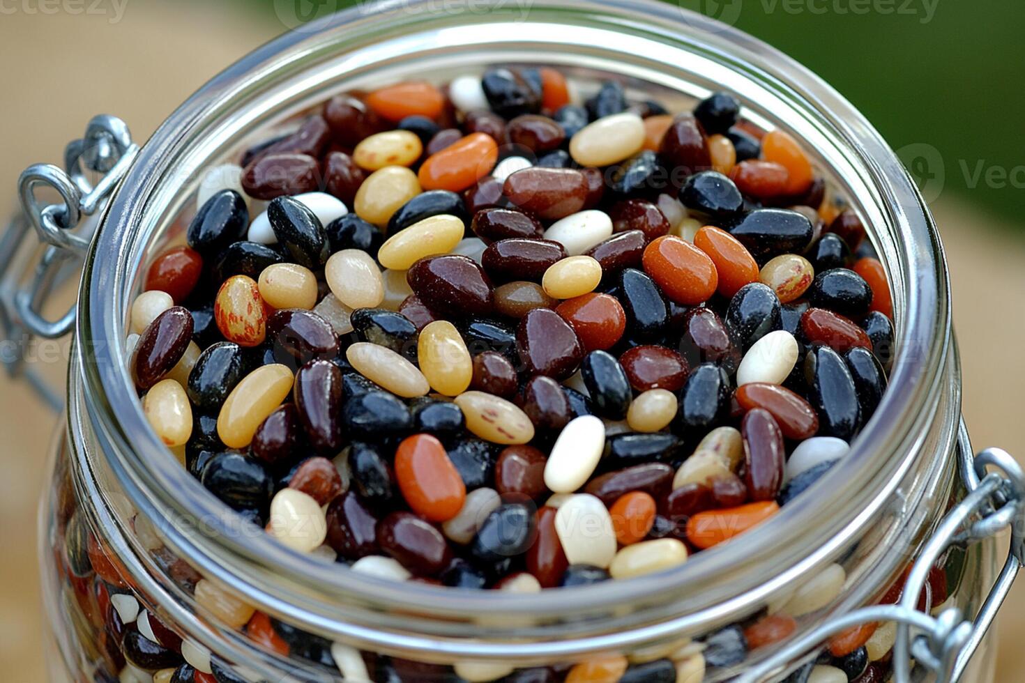 A jar filled with beans and other legumes photo