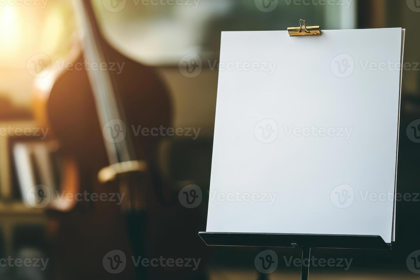A white sheet of paper is on a stand photo