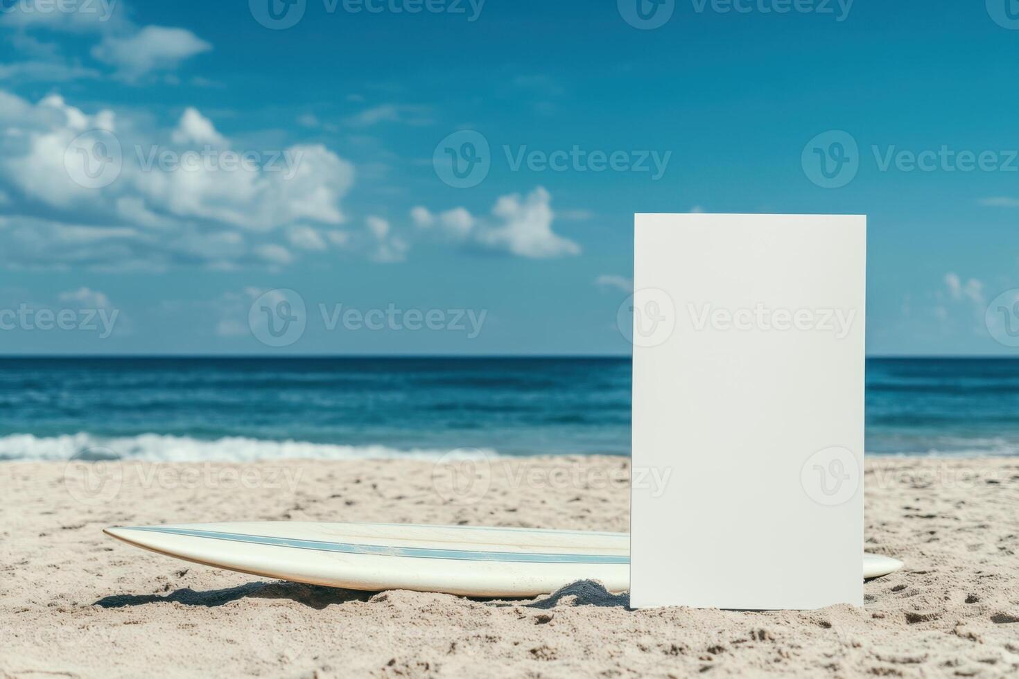 A white object is sitting on the sand next to the ocean photo