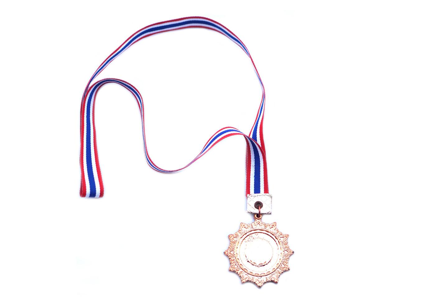 Victory medal with red white blue ribbon strip from competition, isolated on white background. Concept, symbol of win, award ,successful, pride and championship. photo