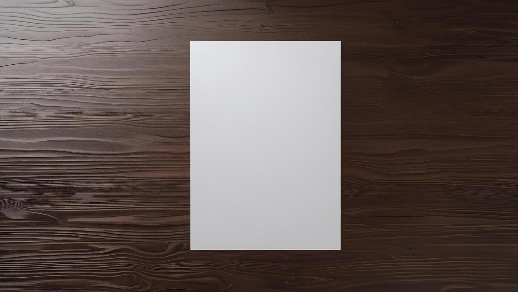 White blank paper on wooden background photo
