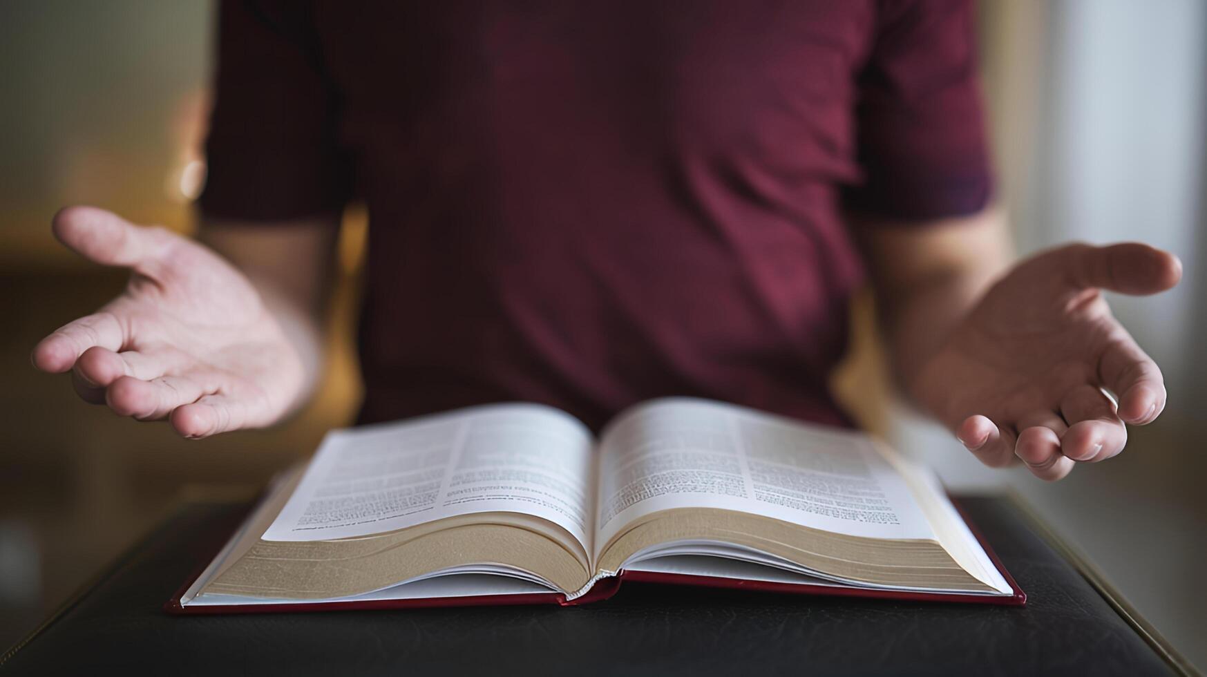 Open Bible Hands Raised in Prayer Seeking Faith Spiritual Guidance Soft Lighting Close up photo