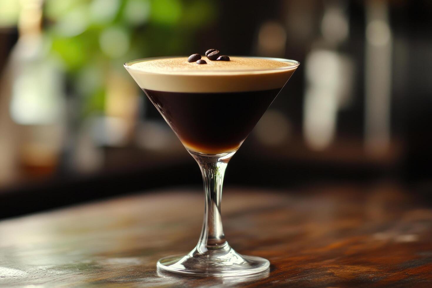 A coffee drink in a glass on a table photo