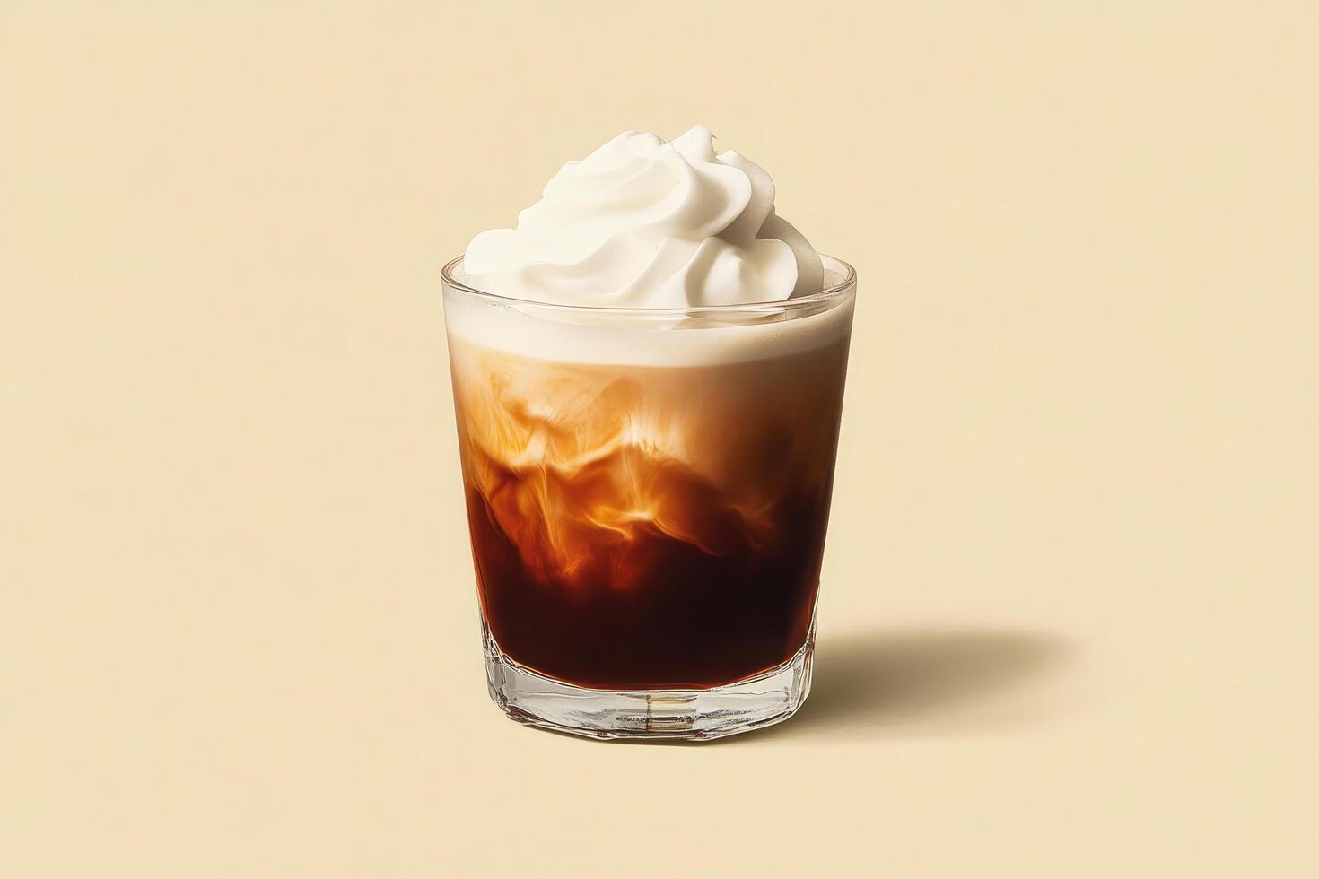 An iced coffee with whipped cream on top photo