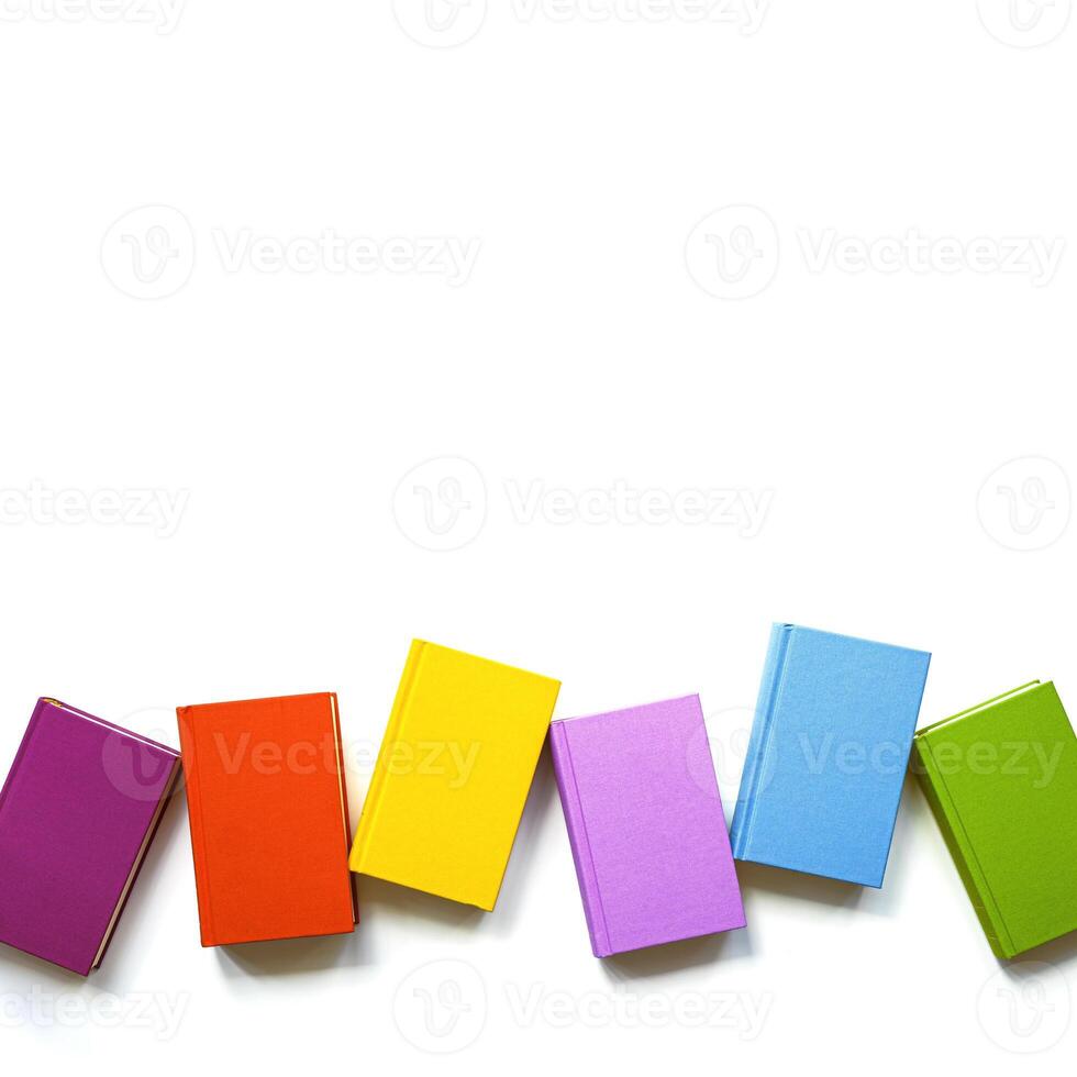 Multicolors book minimal pattern with bright colorful cover, handback books, Top view mockup for library, education theme. Read paper book and study concept. Isolated on white background photo