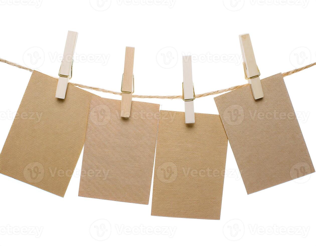 Empty Cards Suspended on a String with Wooden Clips photo