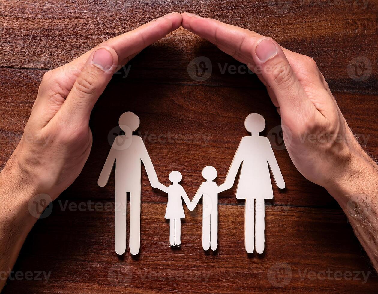 Protective Hands Surrounding a Family Symbol of Care photo
