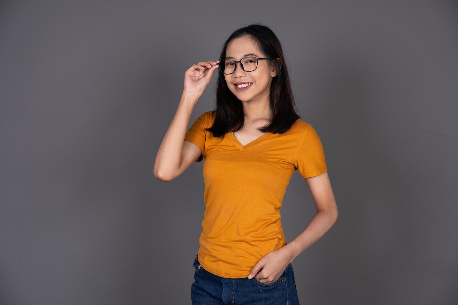 Portrait of a Smiling Woman Wearing Glasses with a Cheerful Expression Isolated photo