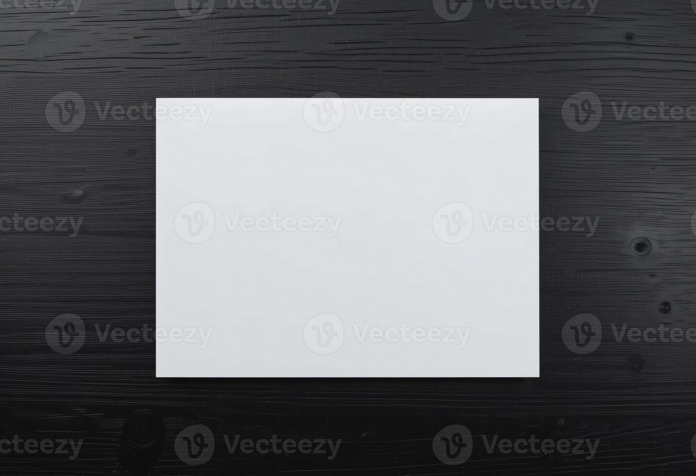 Empty or Blank white A4 paper, Horizontal paper, on black wooden background photo